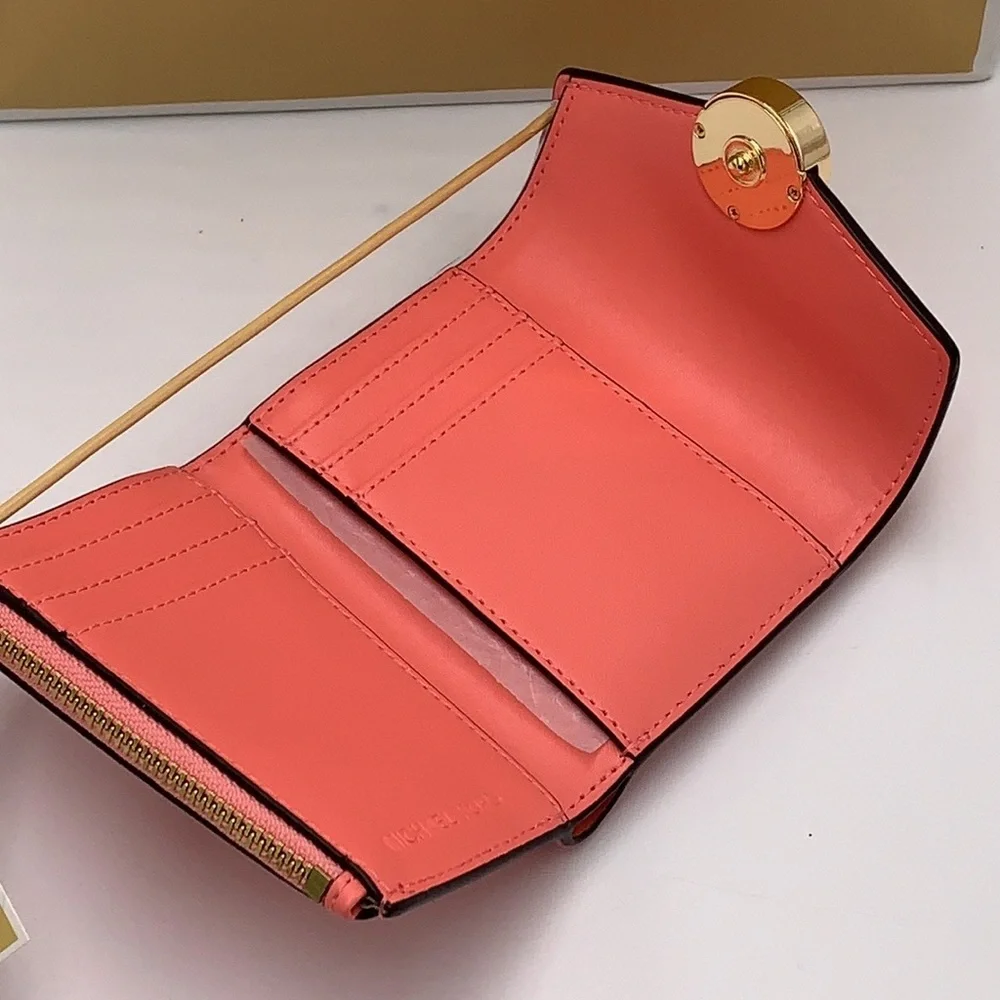 NWT MICHAEL KORS CARMEN MEDIUM FLAP BIFOLD WALLET GRAPEFRUIT COLOR